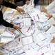 Election Commission officials count votes after presidential and parliamentary elections in Bosnia and Herzegovina last October.